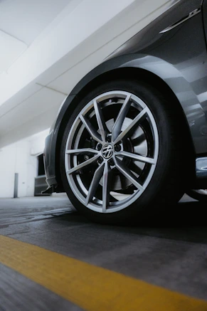 Close-up of a modern car wheel with alloy rim.