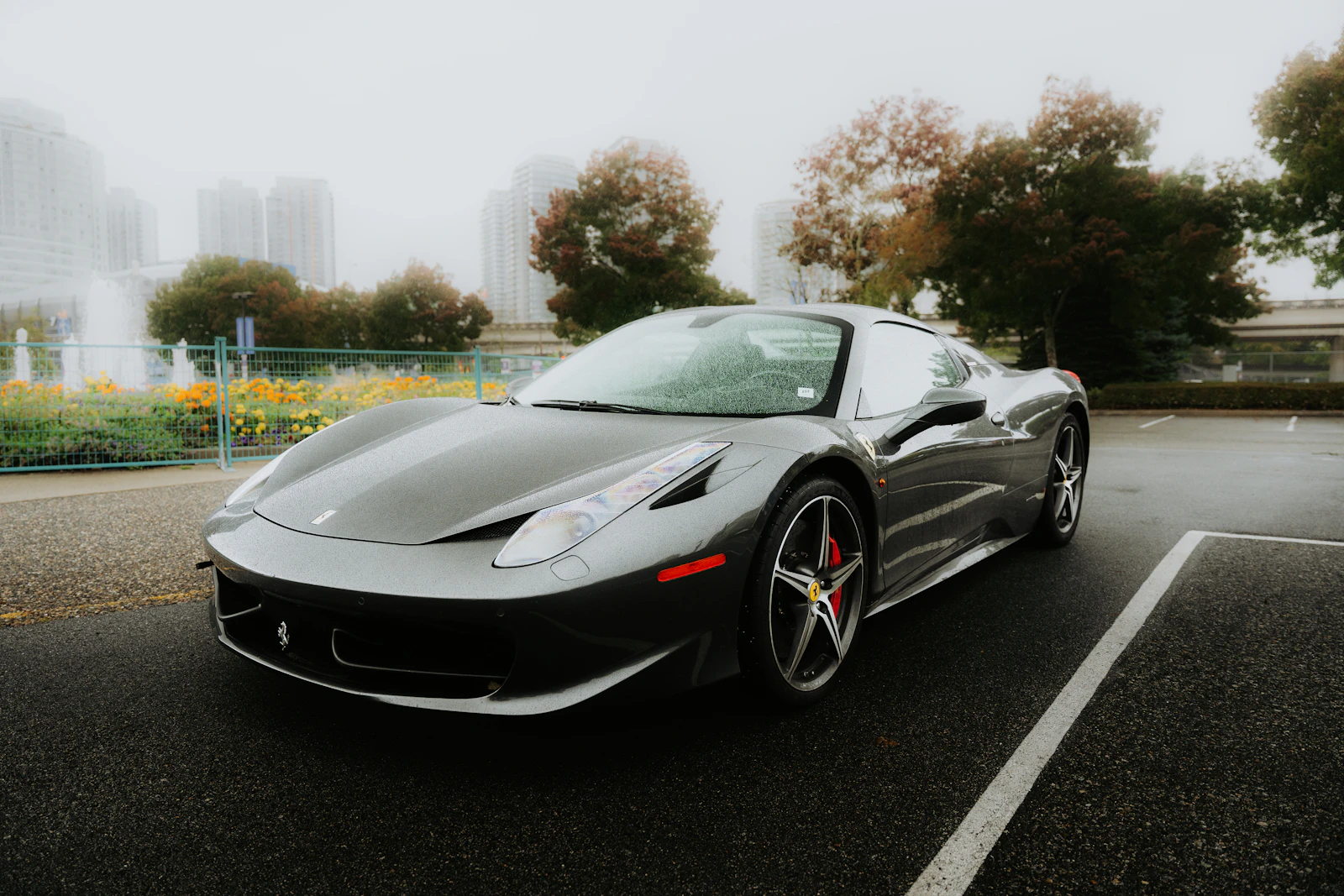 Grey Ferrari 458 Italia parked in a lot