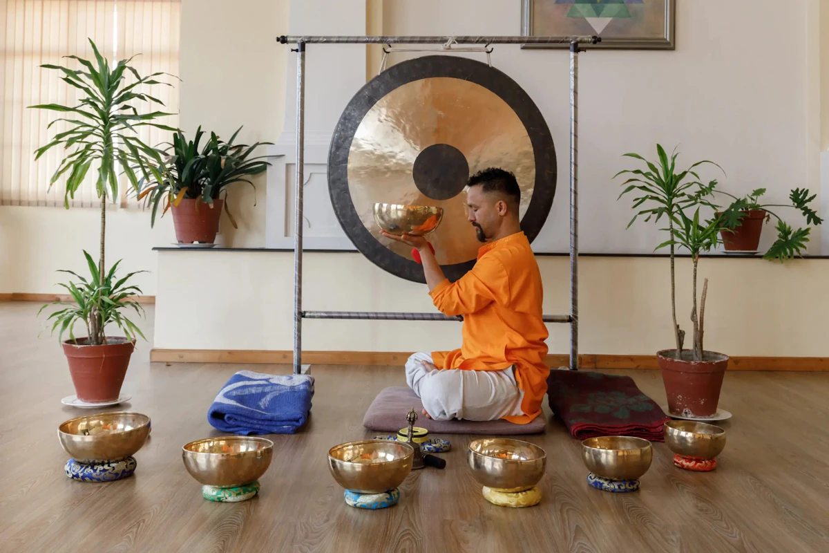 Candidate C — practitioner with gong