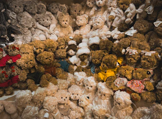 A large collection of assorted teddy bears