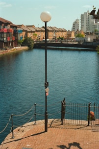 Waterway with buildings and a lamppost