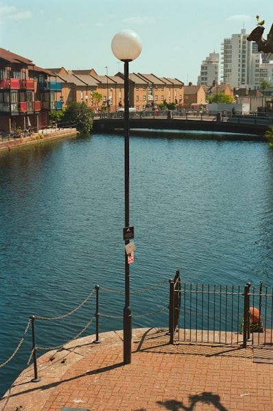 Waterway with buildings and a lamppost