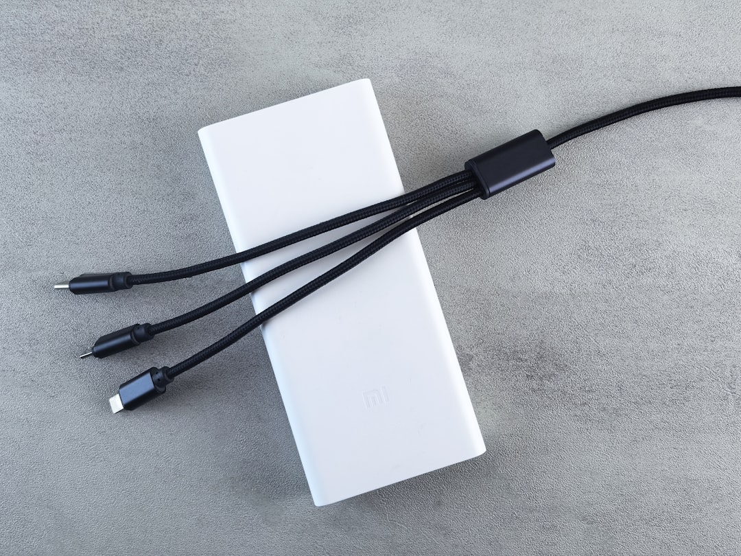 White power bank with three charging cables