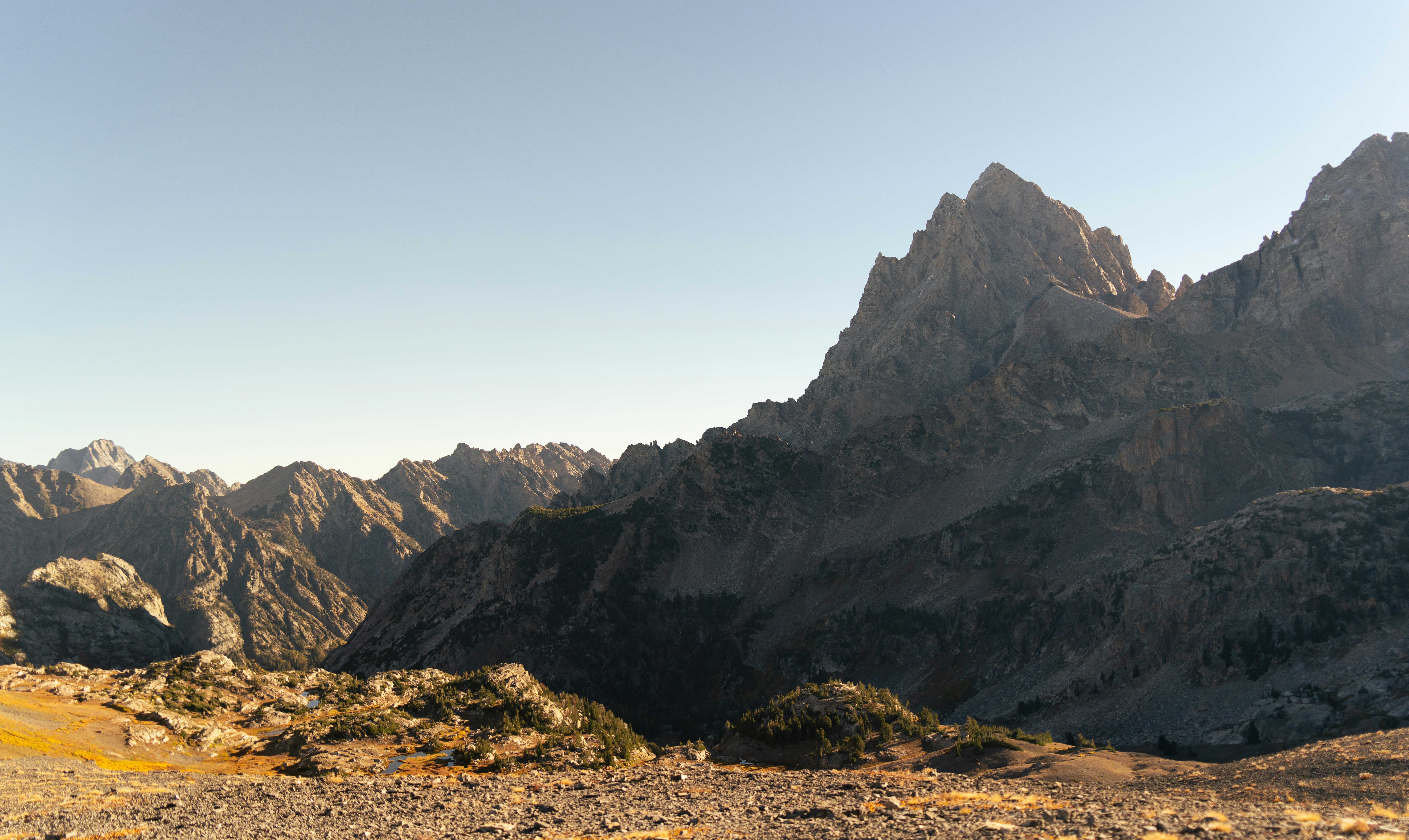 Wilderness mountain landscape, ilustrasi artikel Conquer the Wild Safely: Essential Gear for Remote Camping Adventures 6