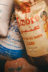 Sacks of flour with arabic and french labels.