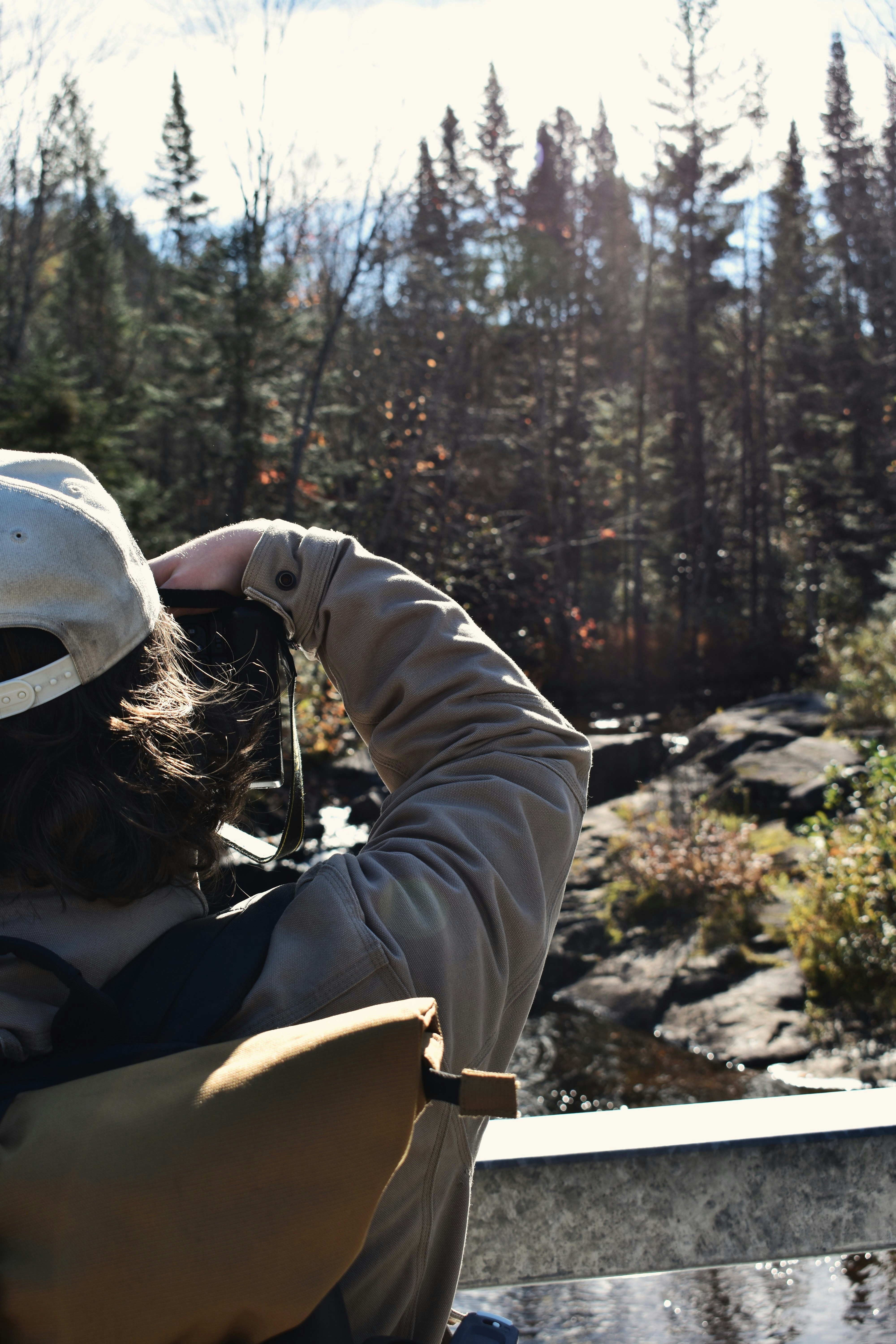 Stewardship staff conducting field monitoring with binoculars