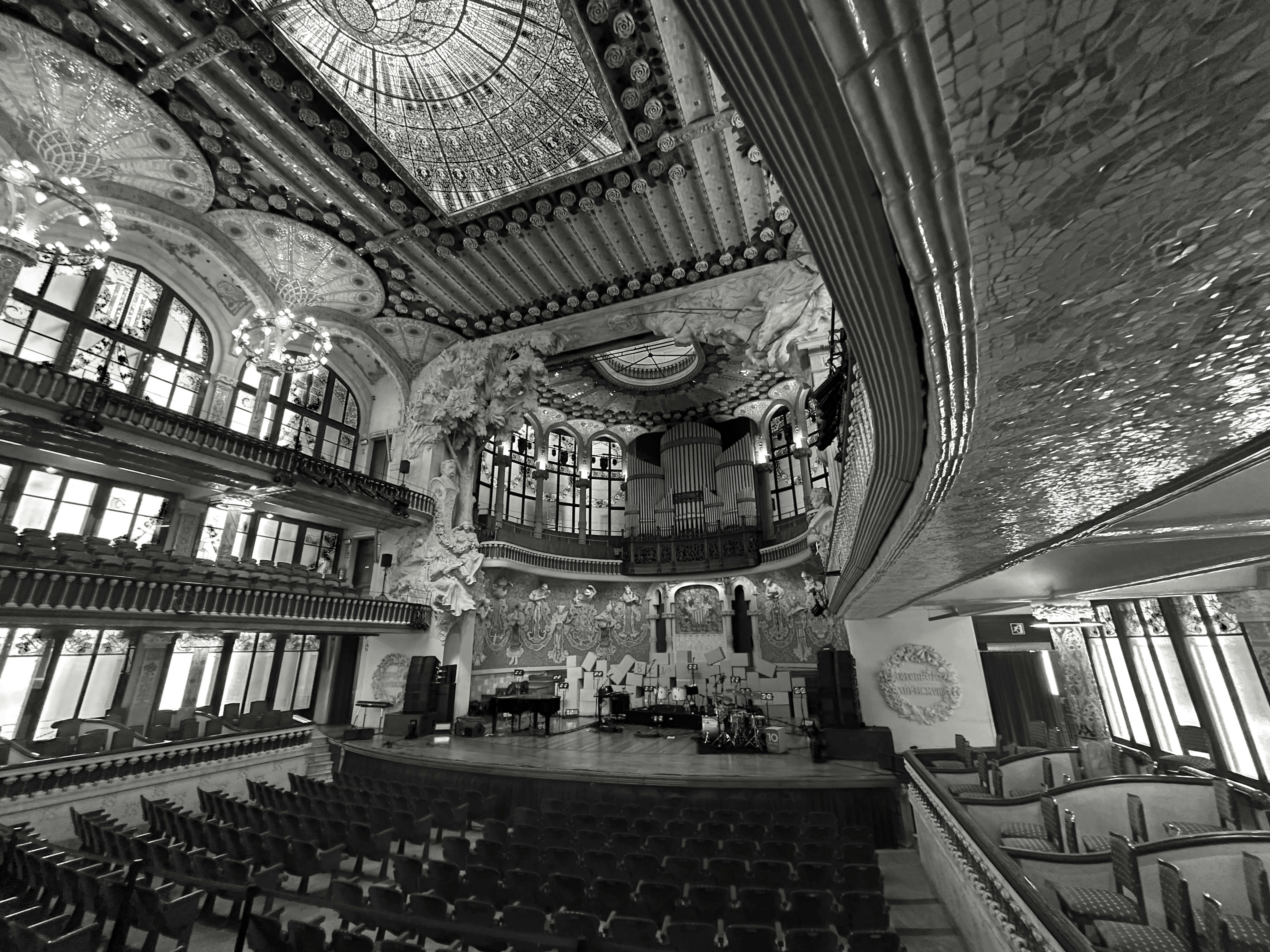 Ornate concert hall interior with stage and seating
