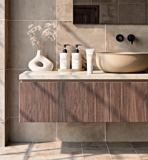 Modern bathroom vanity with sink and toiletries.