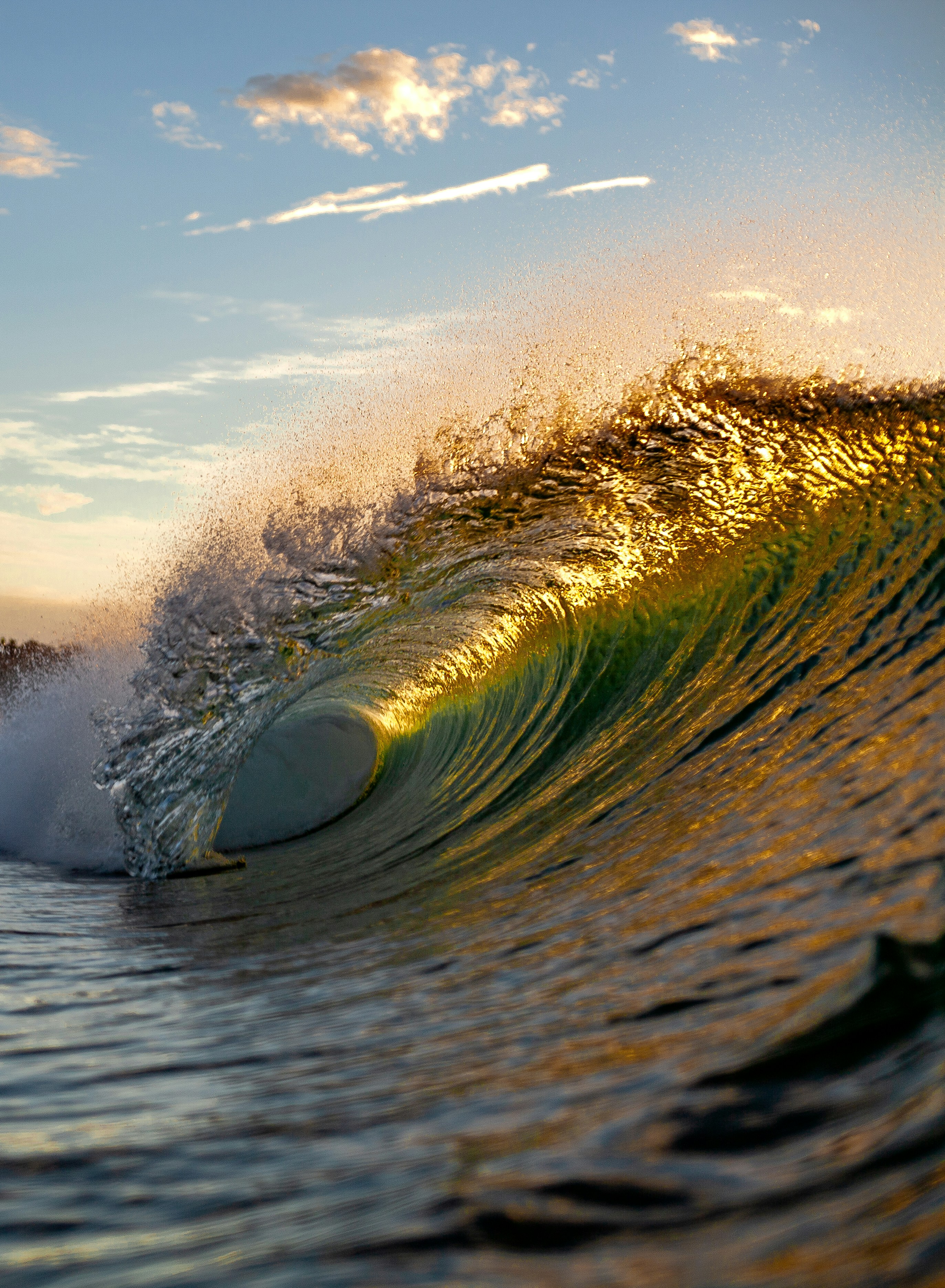 Golden sunlight illuminates a breaking ocean wave. photo – Free Travel ...