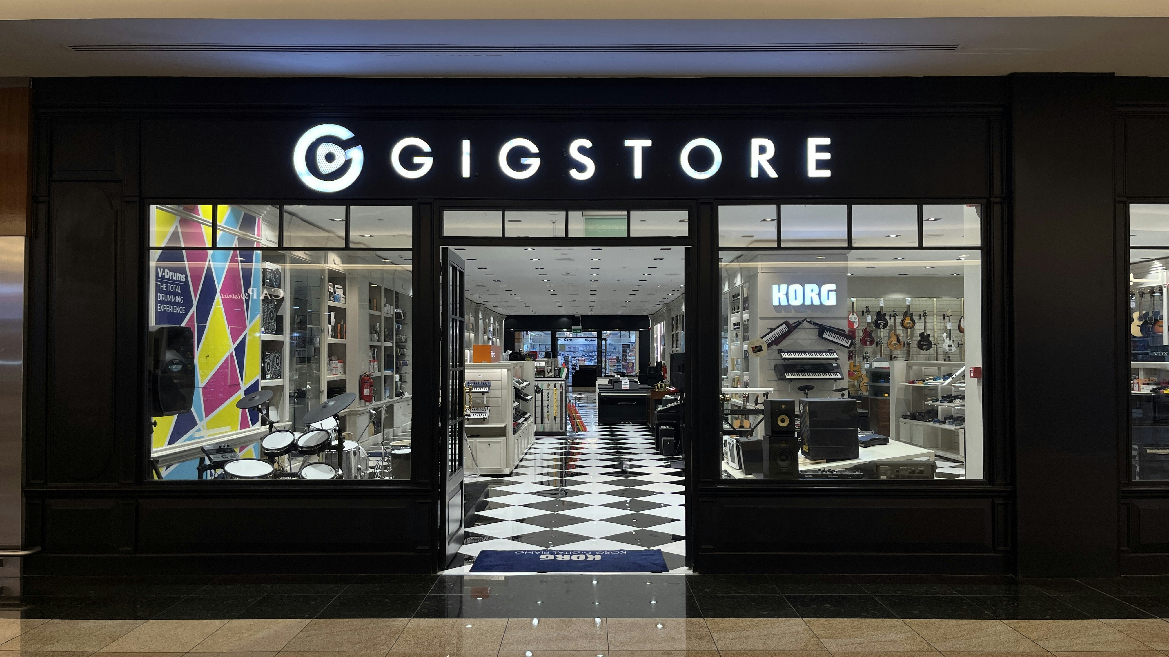 Gigstore entrance with checkered floor inside