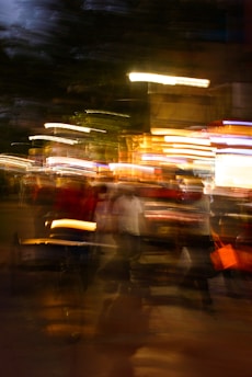 Blurred lights and figures at night