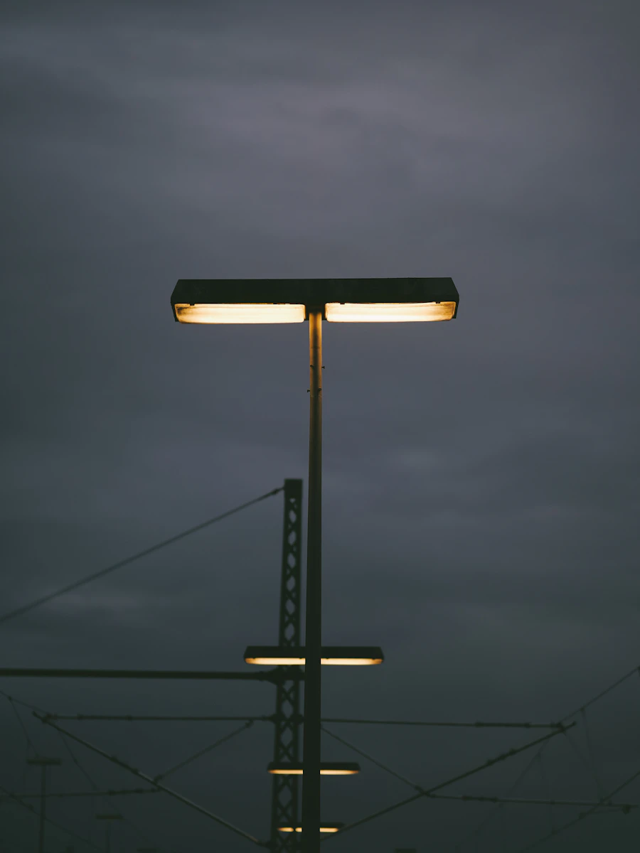 LED street light poles illuminating road