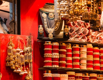 Colorful bangles and jewelry displayed at a market stall.