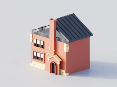 A pink cartoon house with a dark roof.
