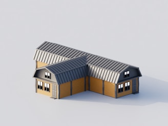 A modern barn-style house with yellow walls.