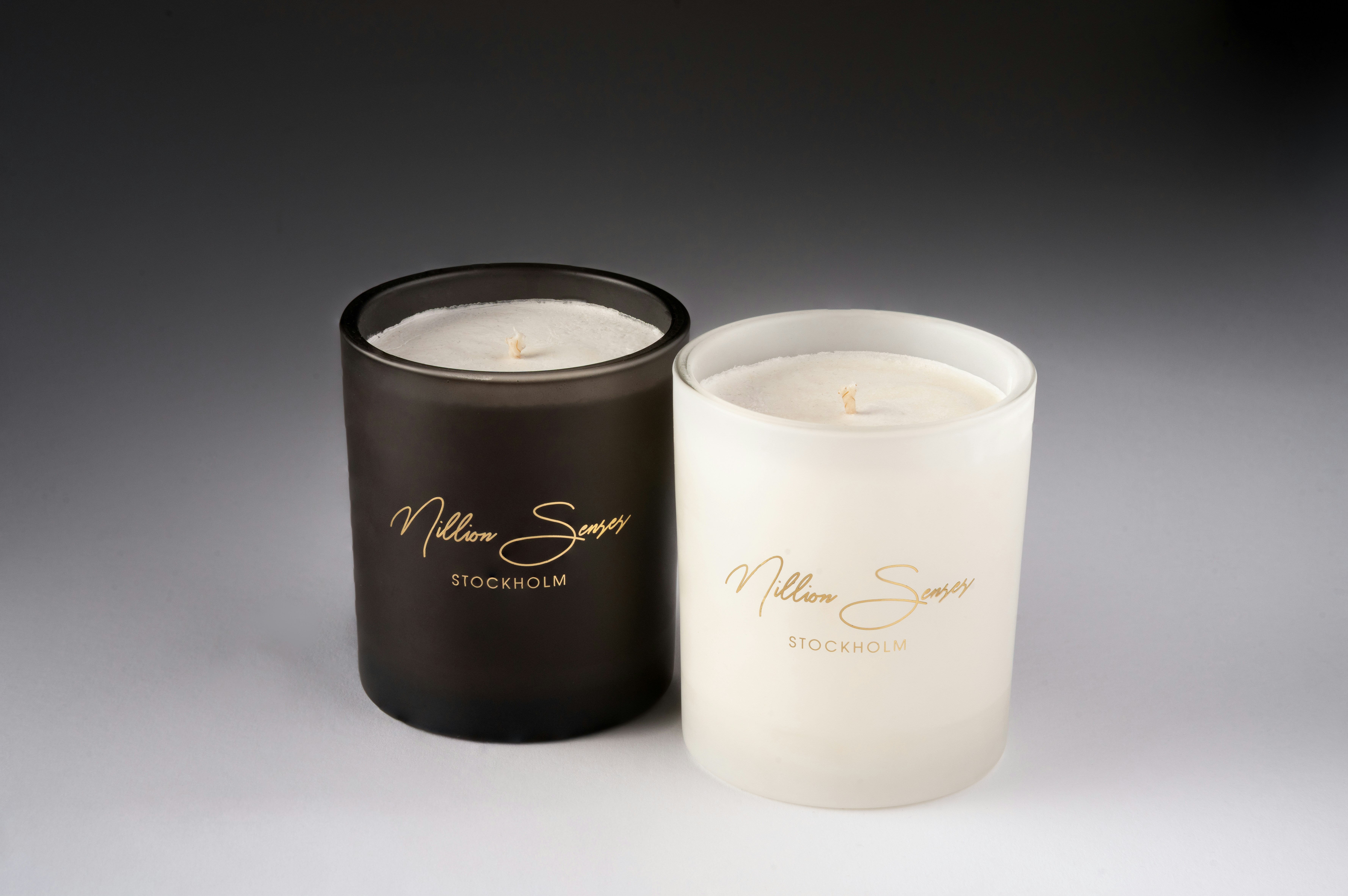 Scented candles with gold labels