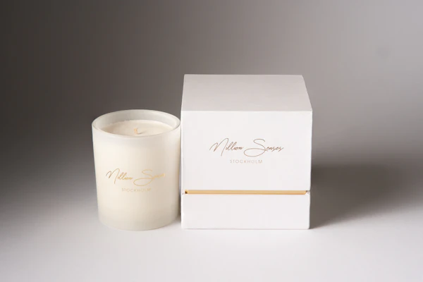 Candle and minimalist product packaging