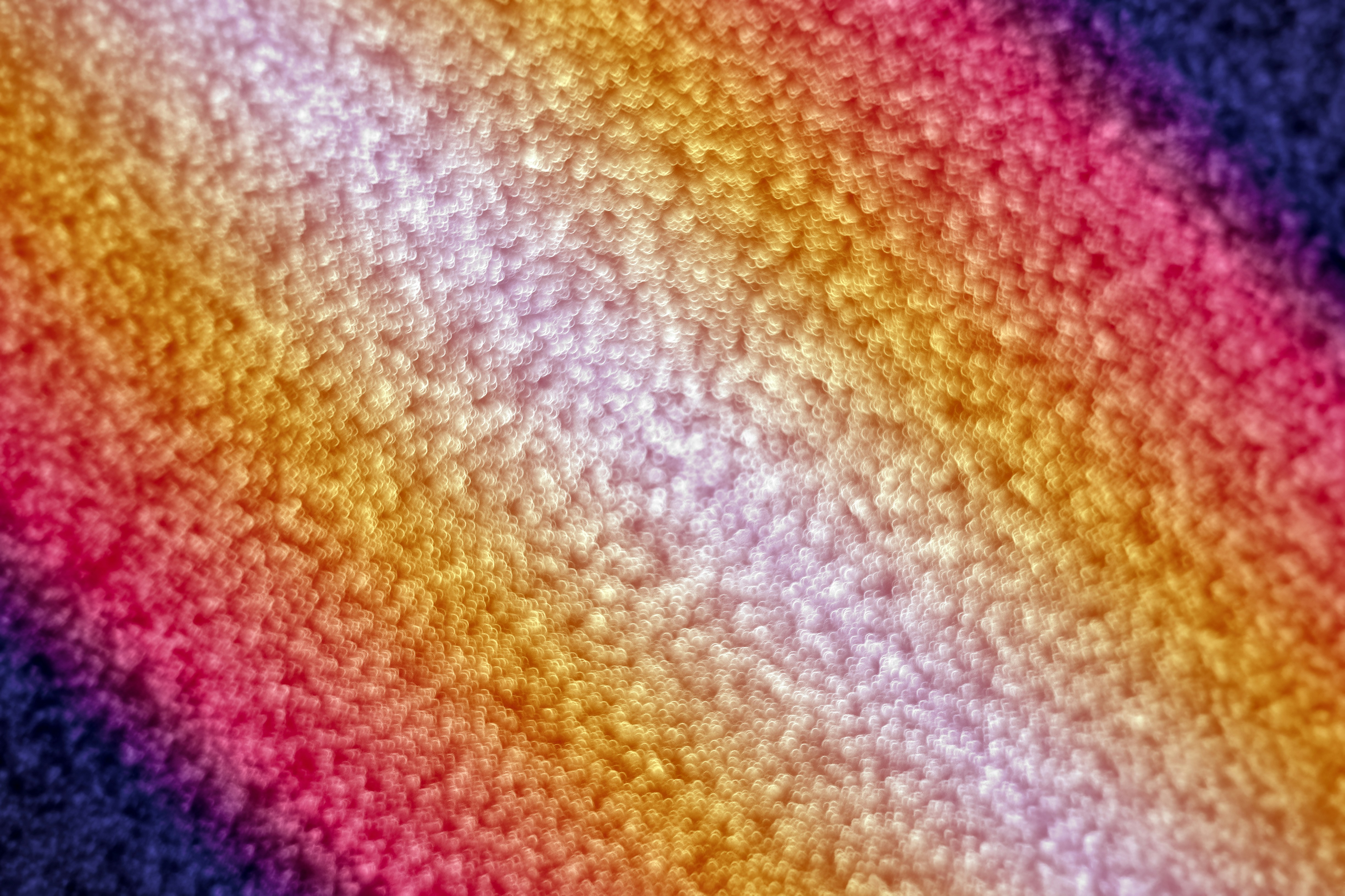 Diagonal stripes of vibrant colors on textured surface