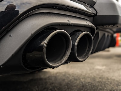 Close-up of a car's dual exhaust pipes