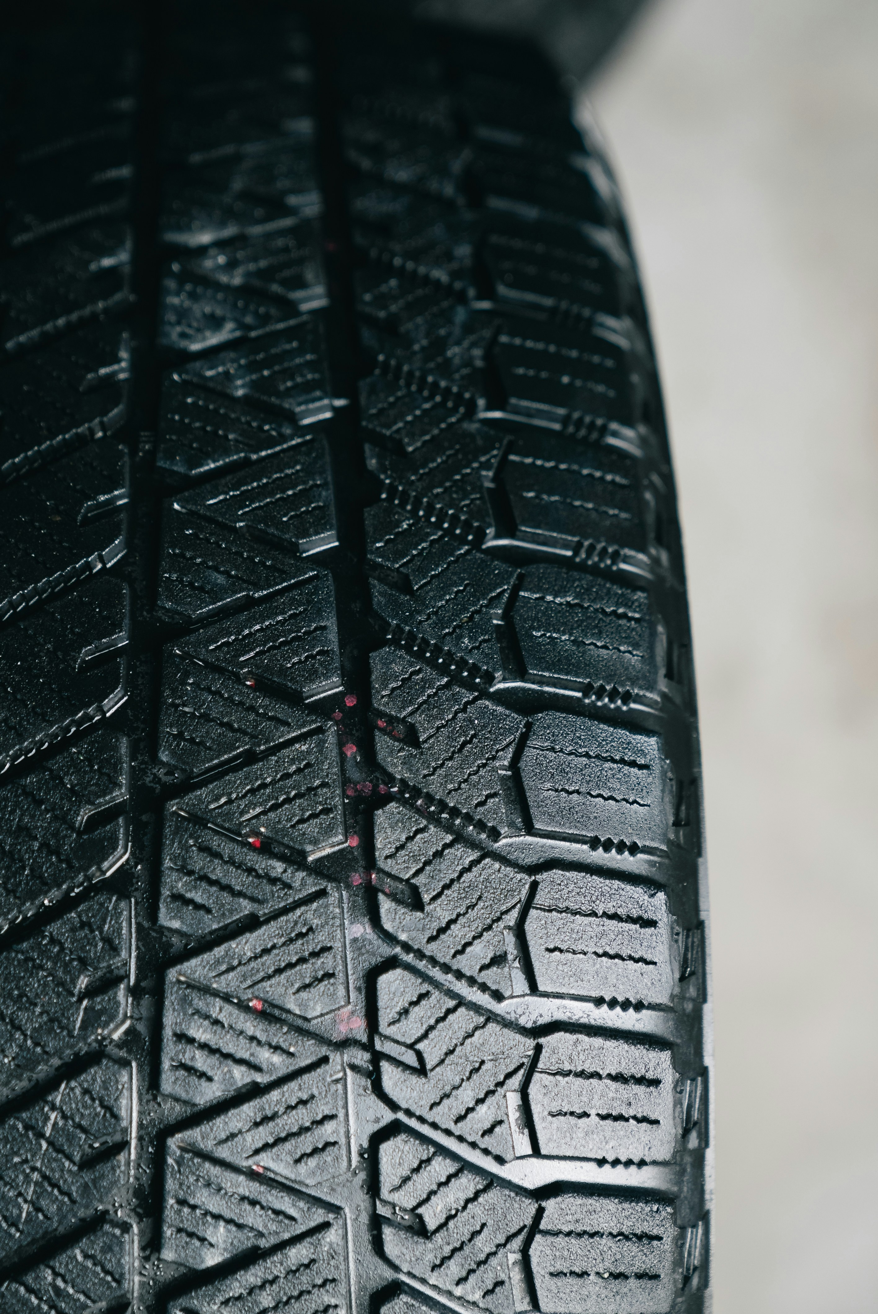 Close-up of a black car tire tread
