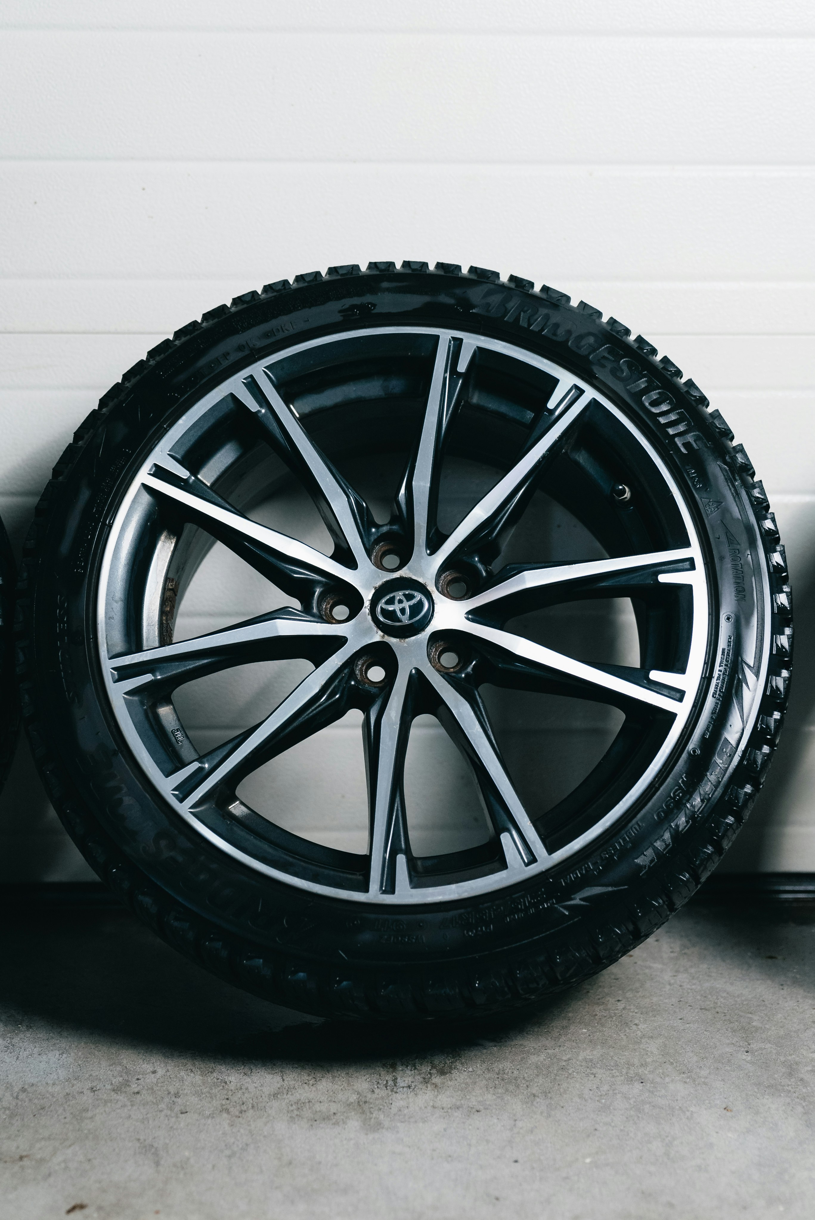 A car wheel with a tire and rim.