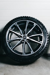 A car wheel with a tire and rim.