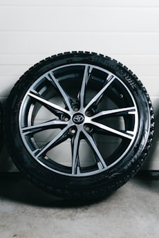 A car wheel with a tire and rim.