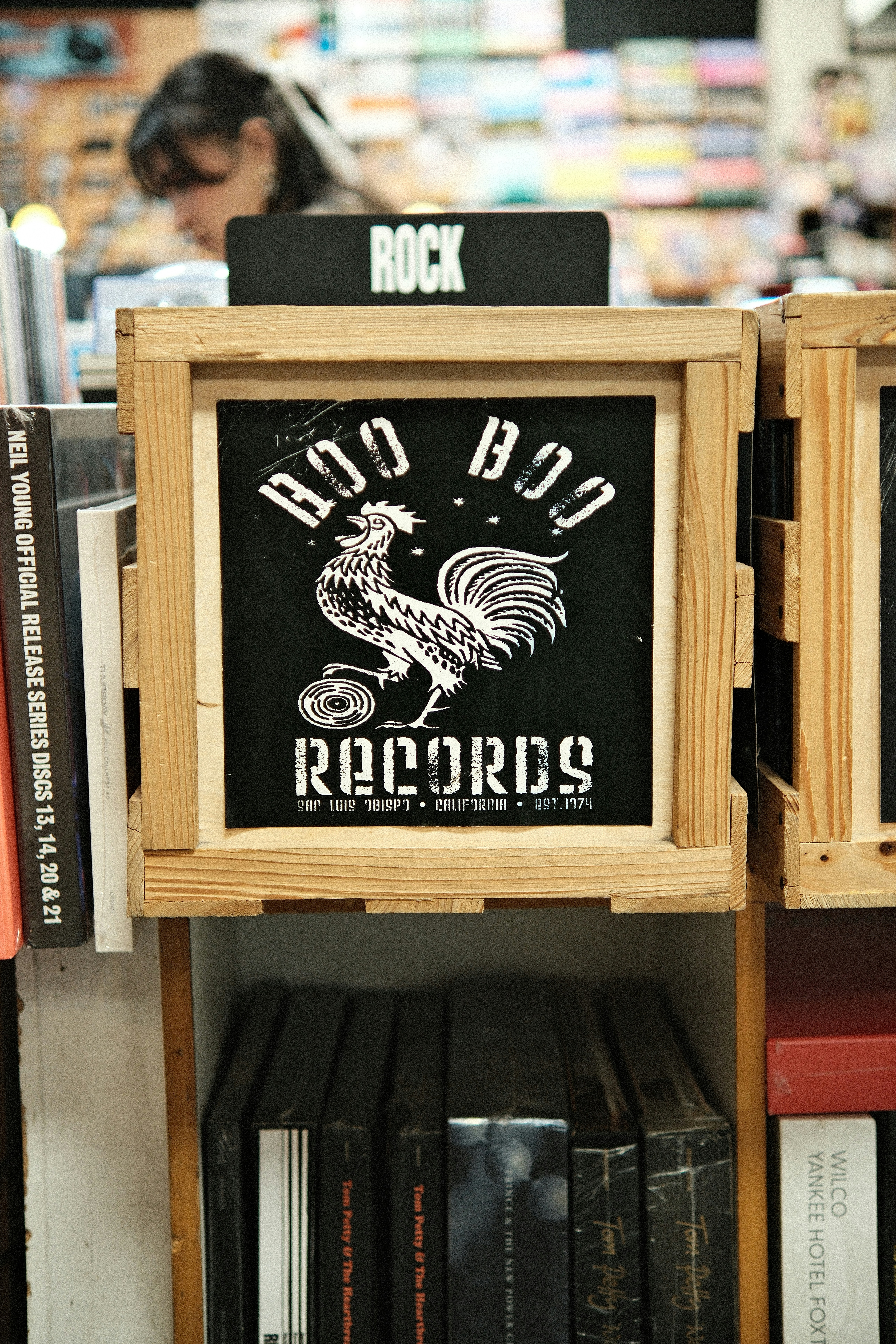 Boo boo records sign with rooster logo