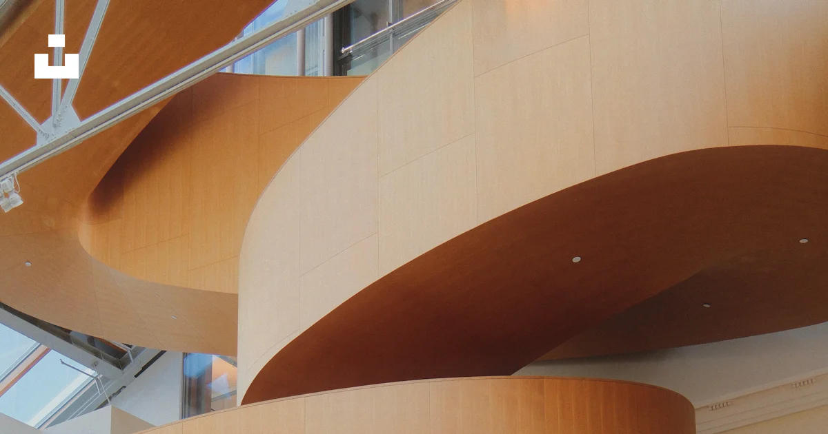 Modern wooden spiral staircase in a bright atrium. photo – Free ...
