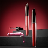 Red liquid lipstick bottles with applicator