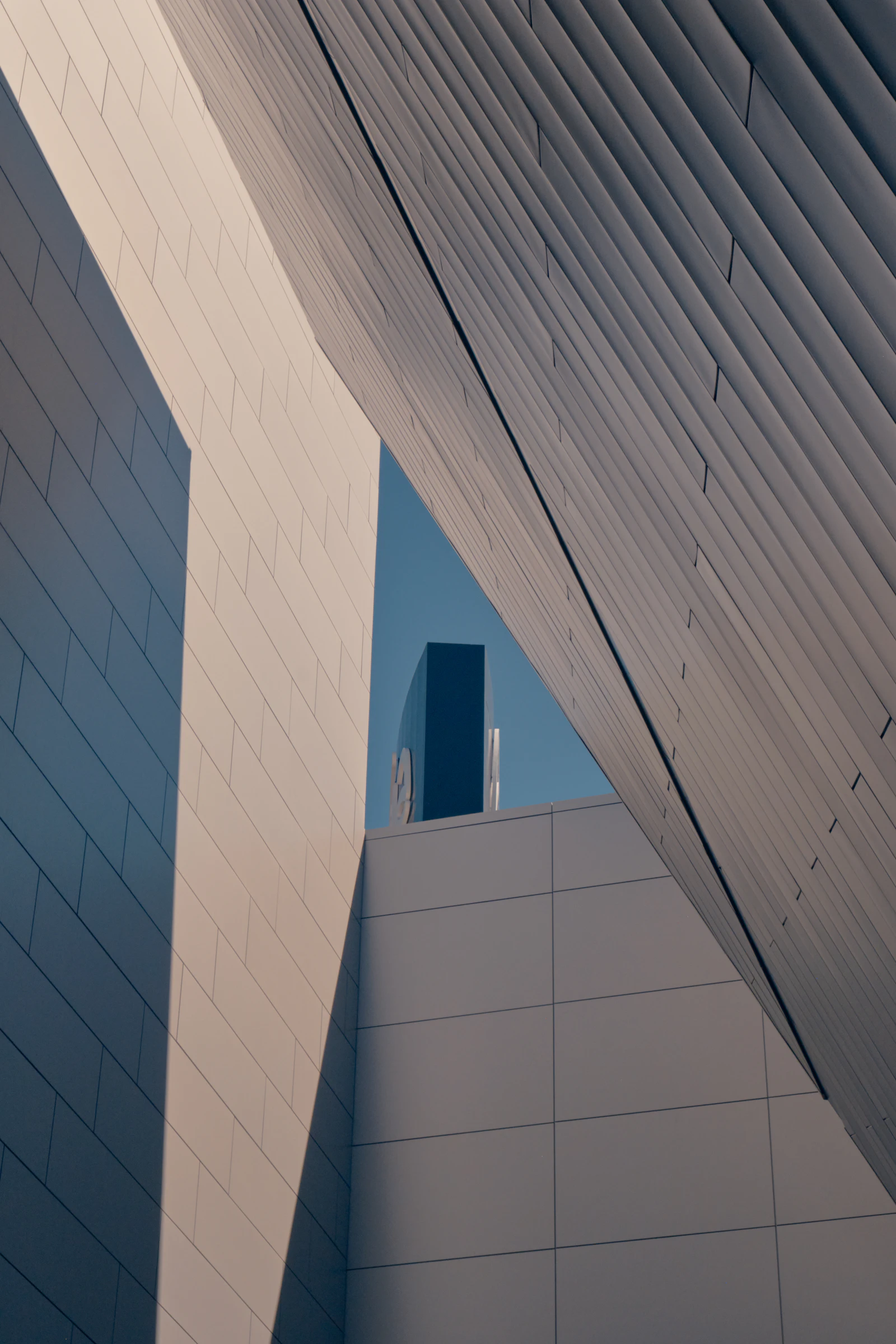 Modern architecture with strong geometric forms, exposed structure, and integration with natural landscape — the West Coast modernist idiom that Ray Kappe helped define