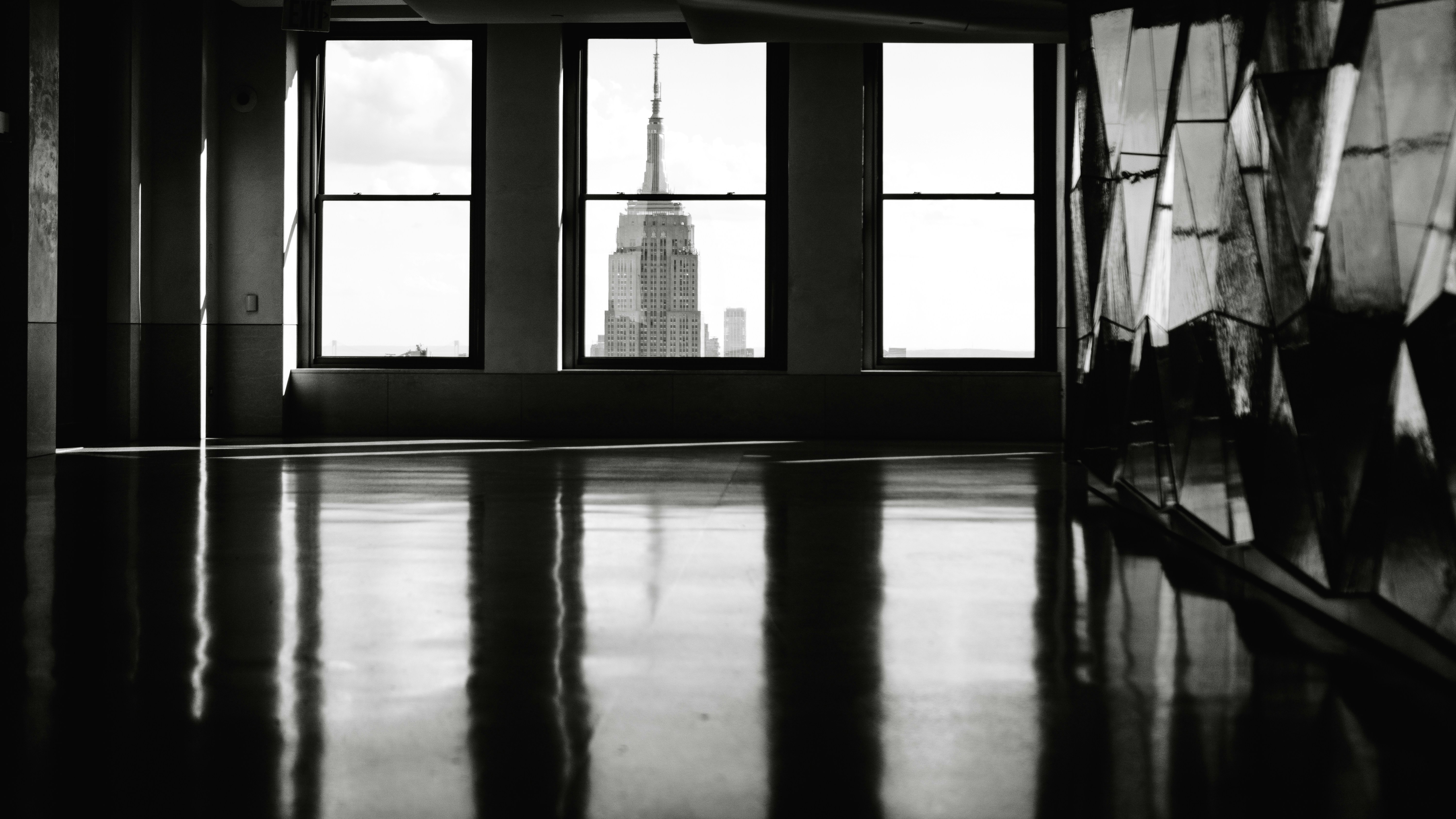 Empire state building seen through large windows