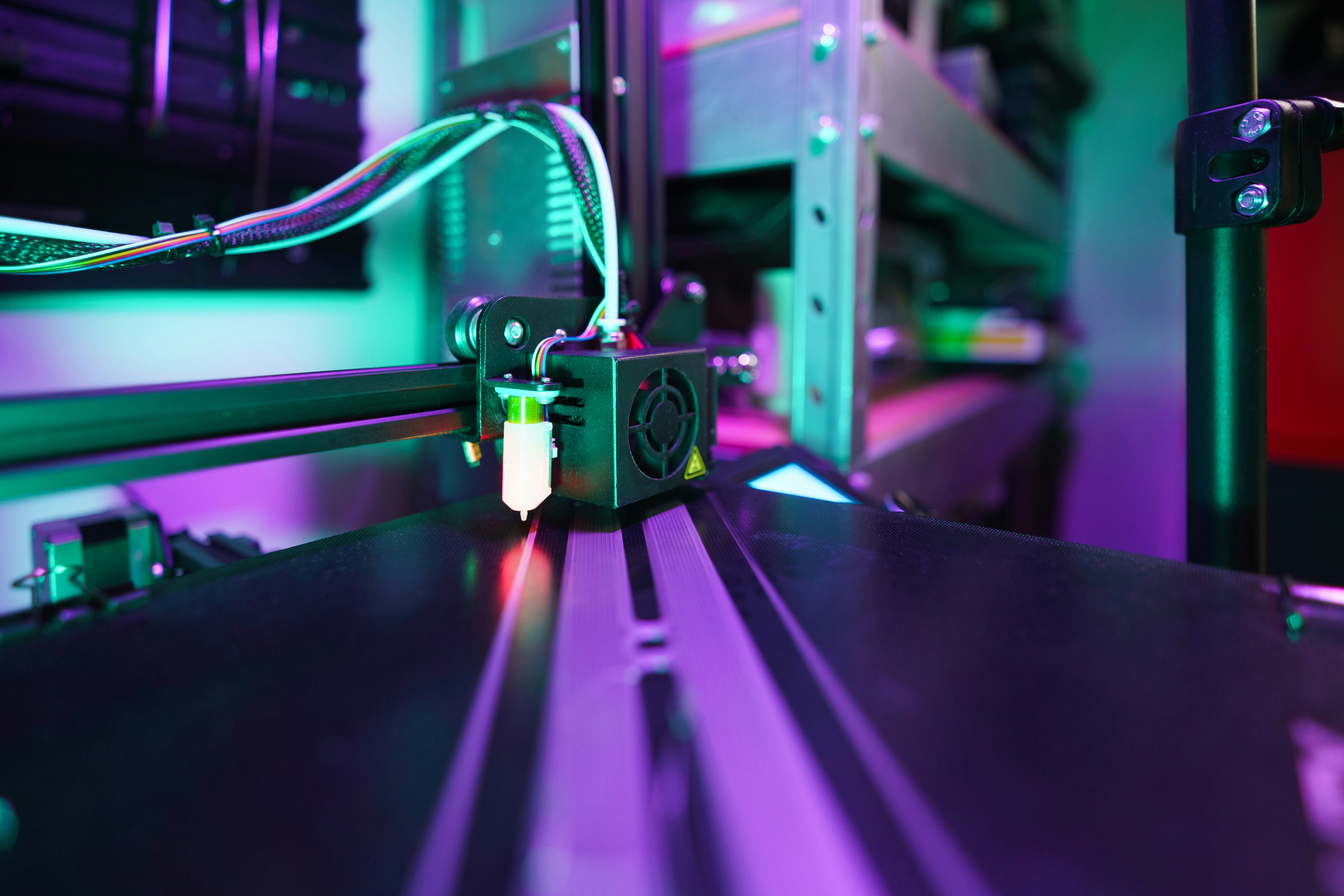 moving over heated bed in illuminated modern fabrication environment