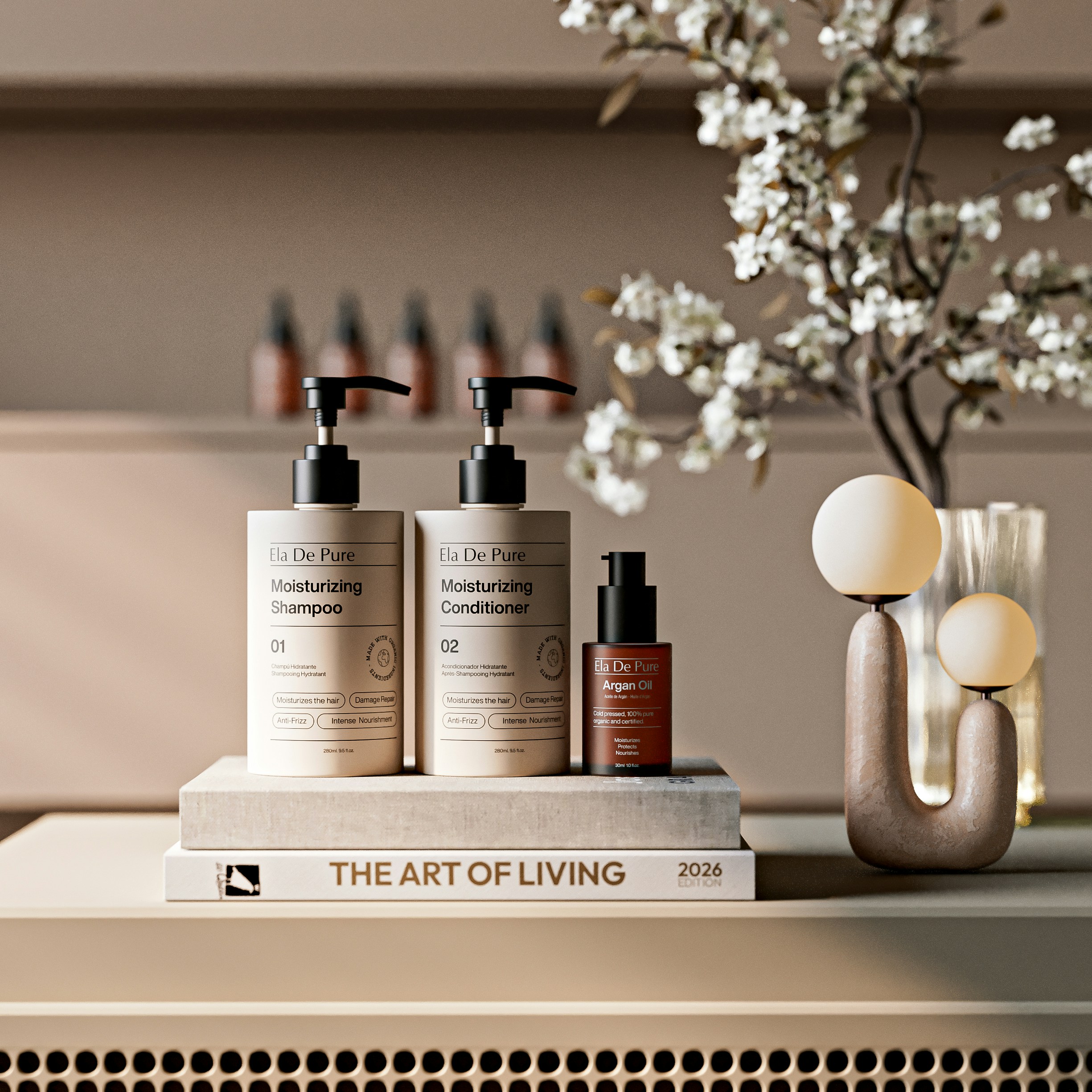 Shampoo, conditioner, and serum bottles on a book.