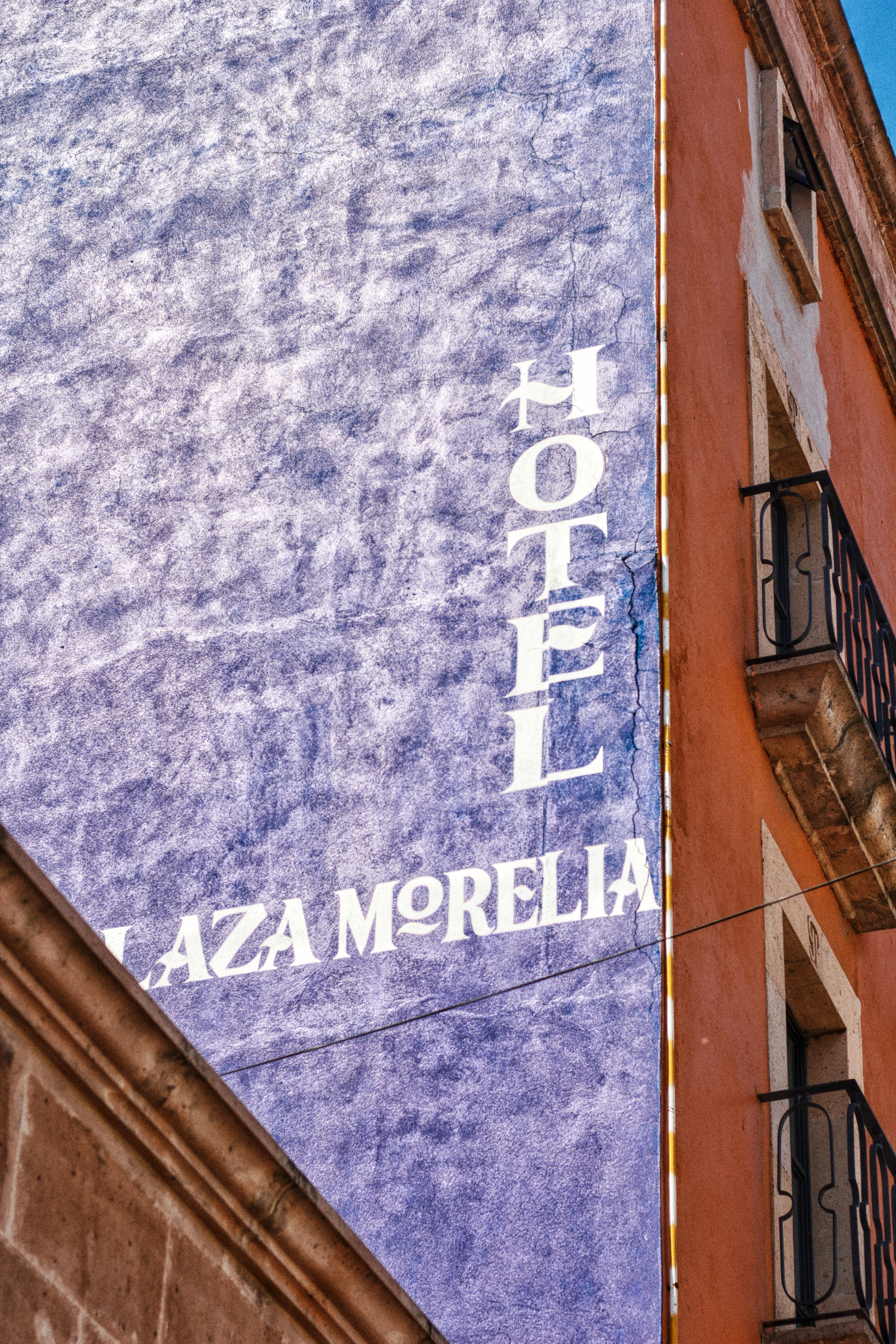 Hotel plaza morelia sign on building exterior