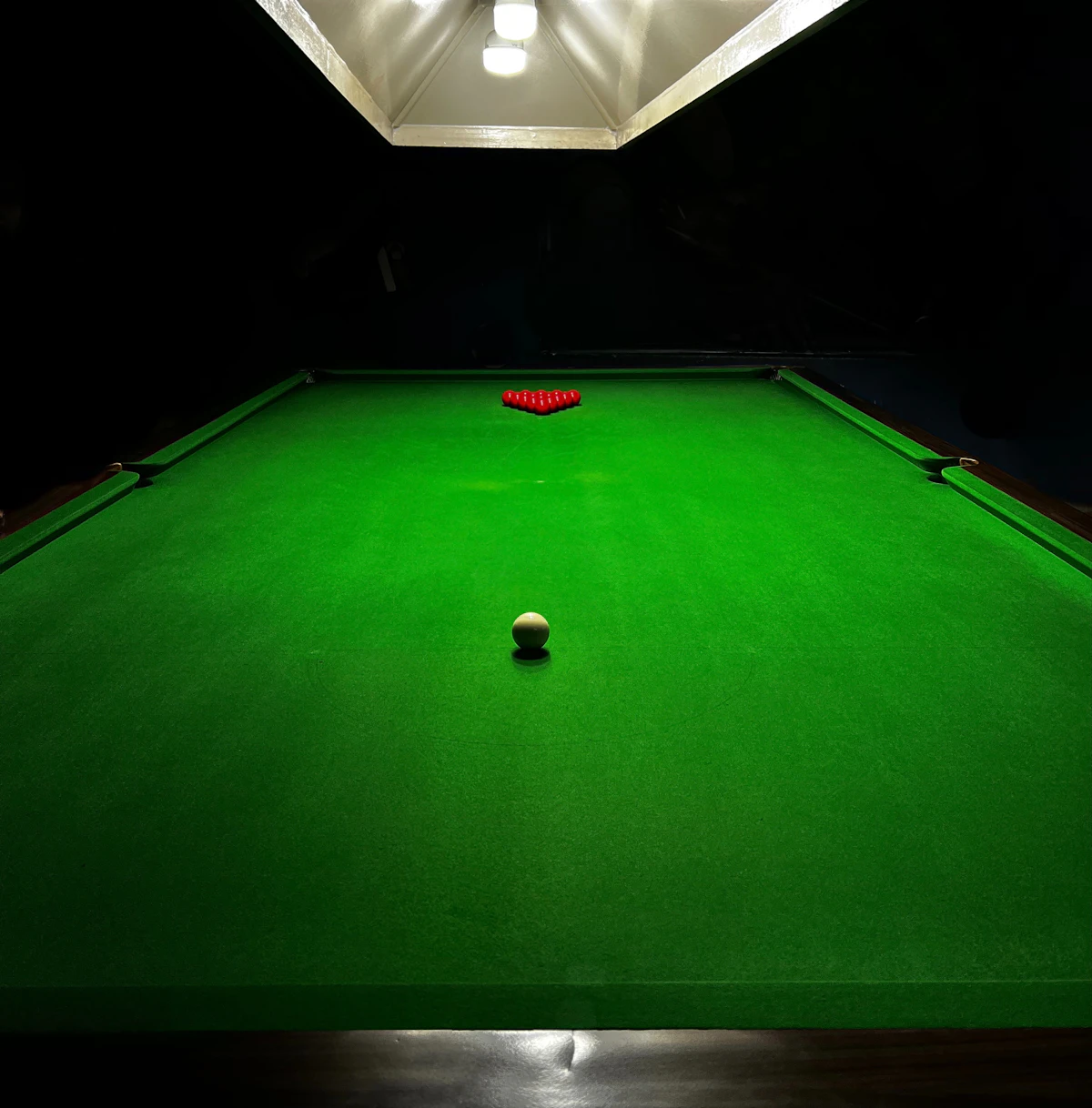 Snooker table with balls and rack