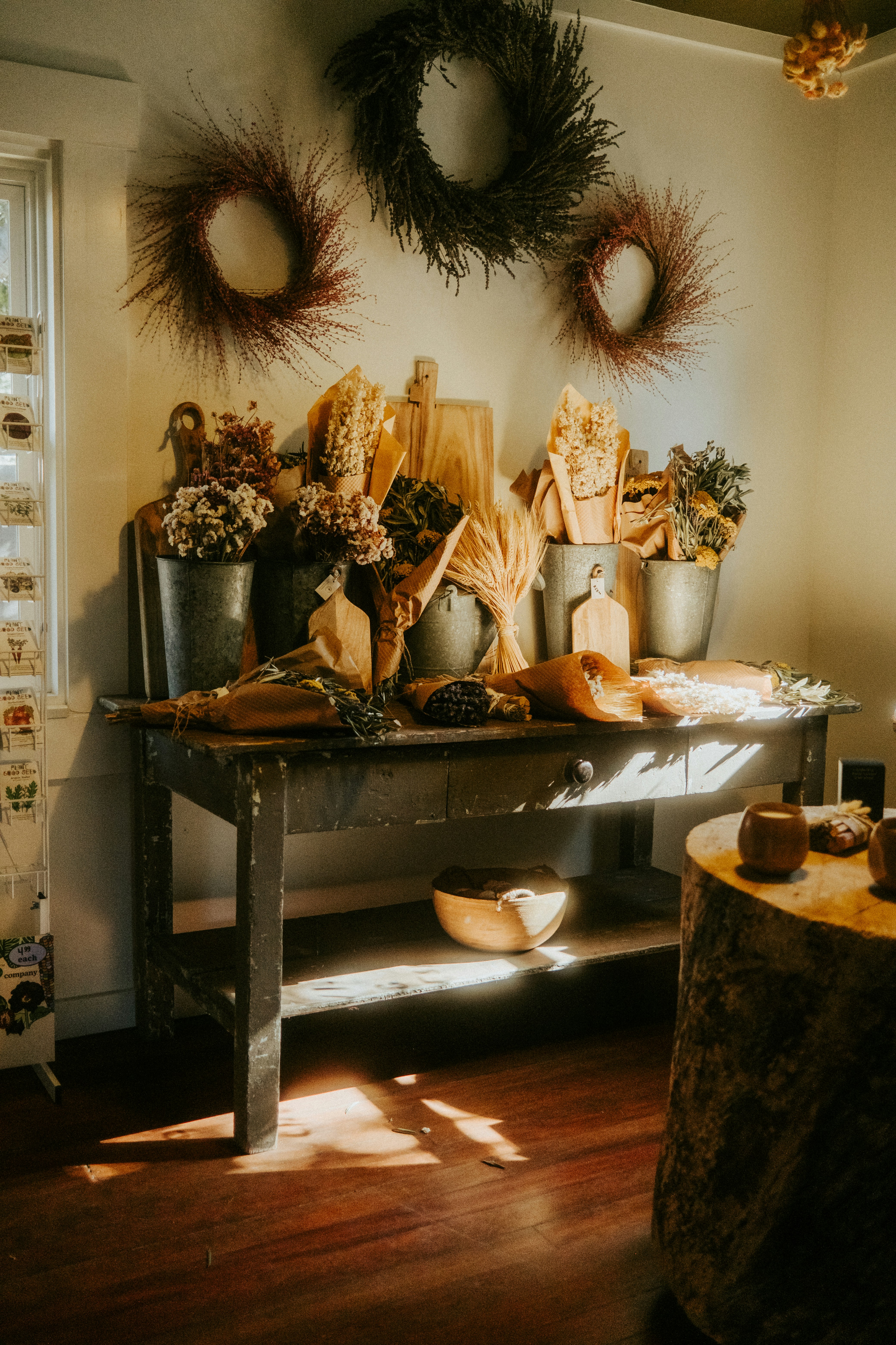 Rustic table display with dried flowers and cutting boards