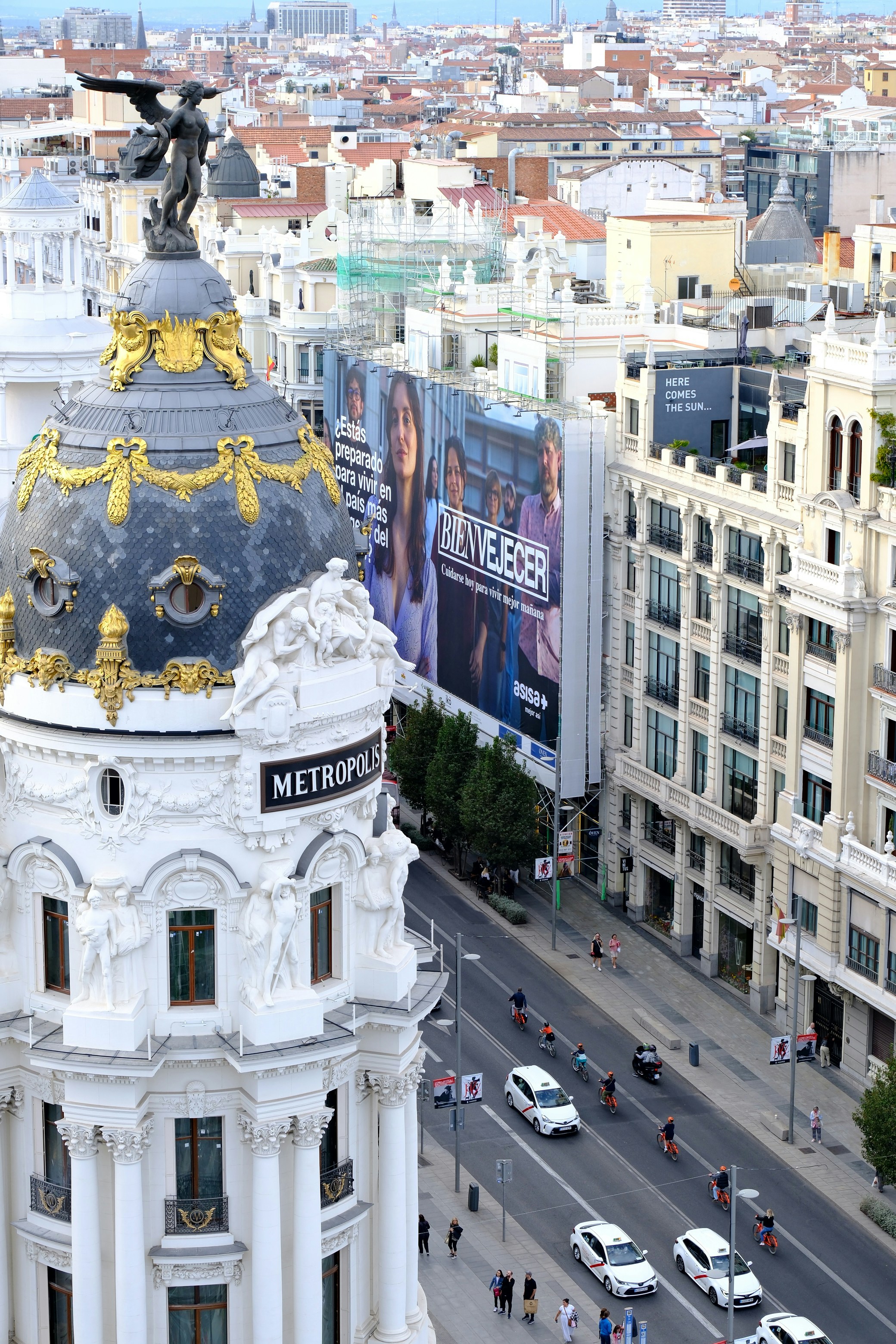 Cityscape with metropolis building and busy street below