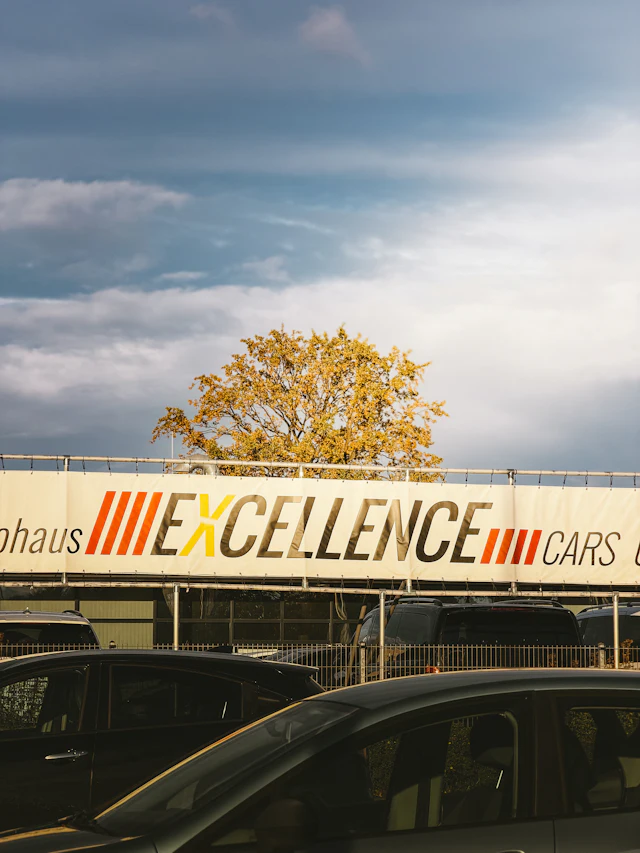 Why Every Car Dealer and Importer Needs a Management System — Vehicles displayed at a car dealership