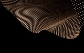 Wavy metallic surface on black background