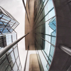Modern glass buildings viewed from below