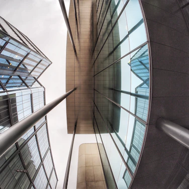 Modern glass buildings viewed from below