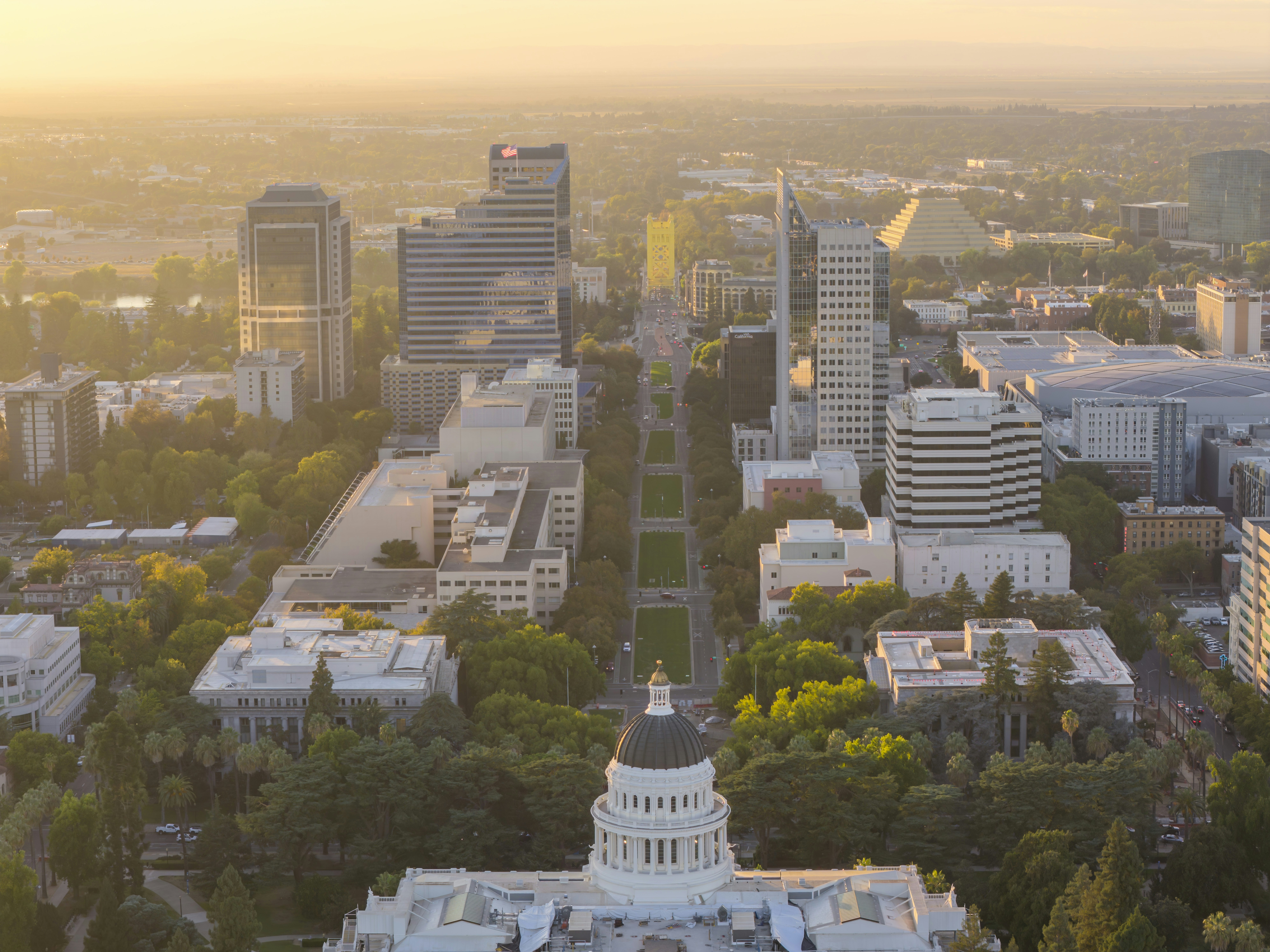 City skyline with capitol building at sunrise