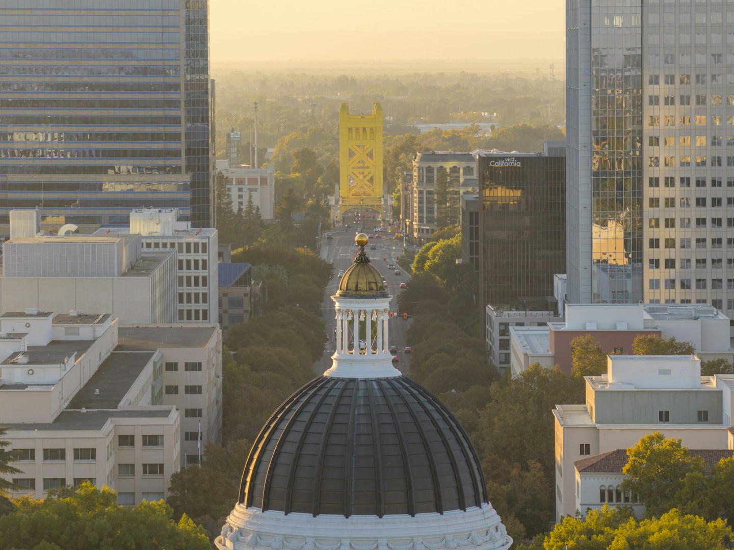 Sacramento city skyline with capitol dome at sunset