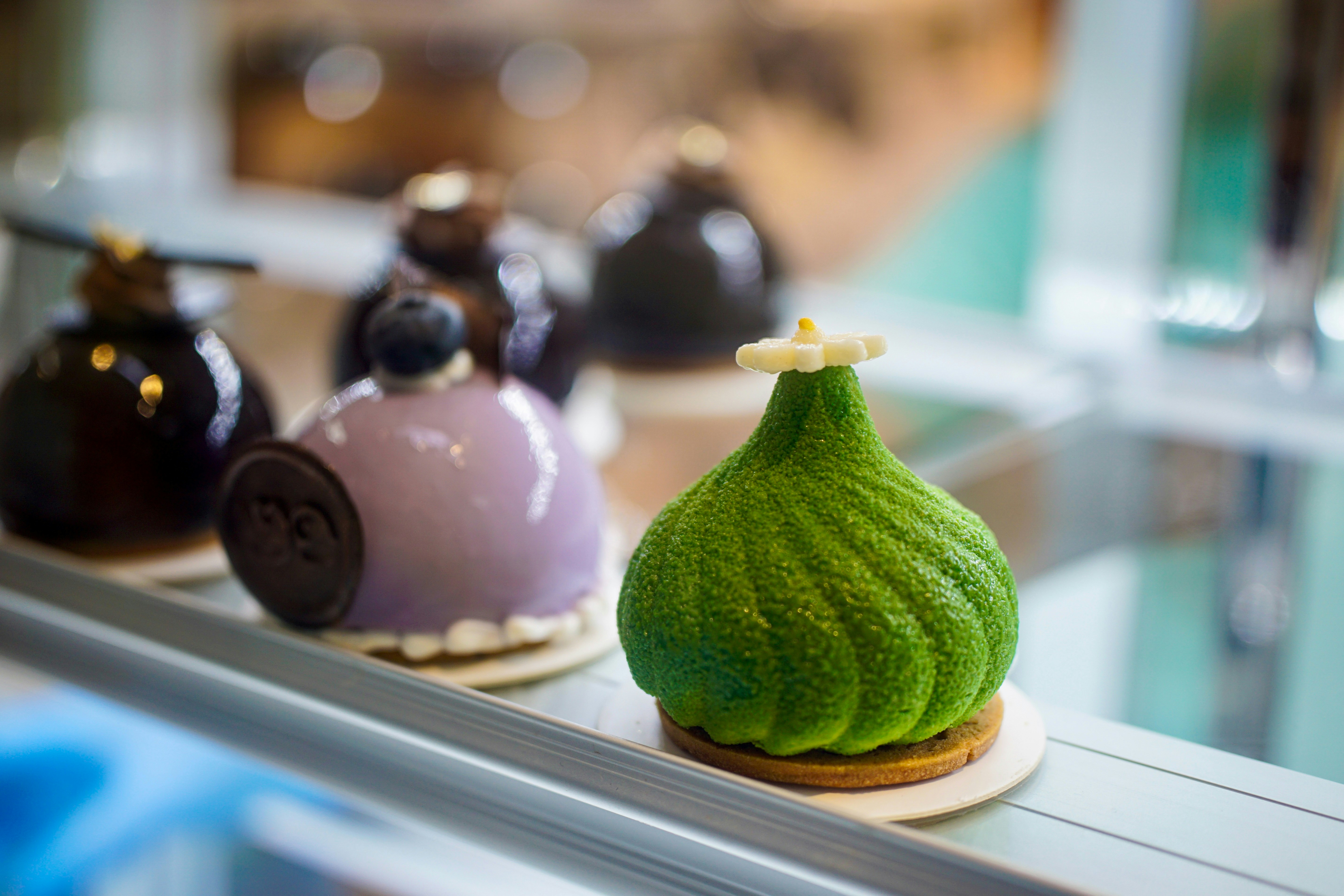 Matcha-inspired green cake photographed in a charming bakery tucked away in Phnom Penh, Cambodia.