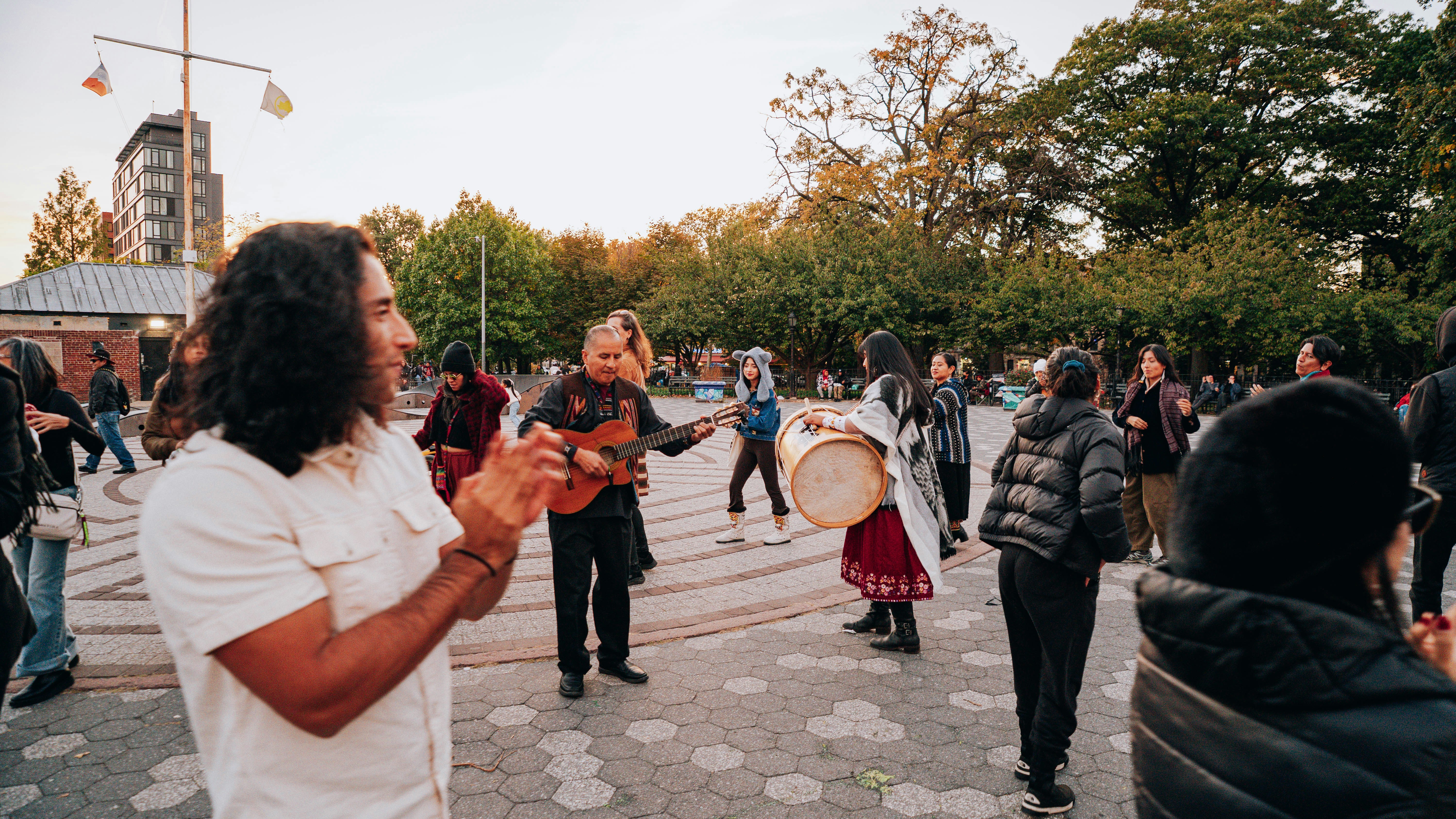 People gathered to watch a street performance