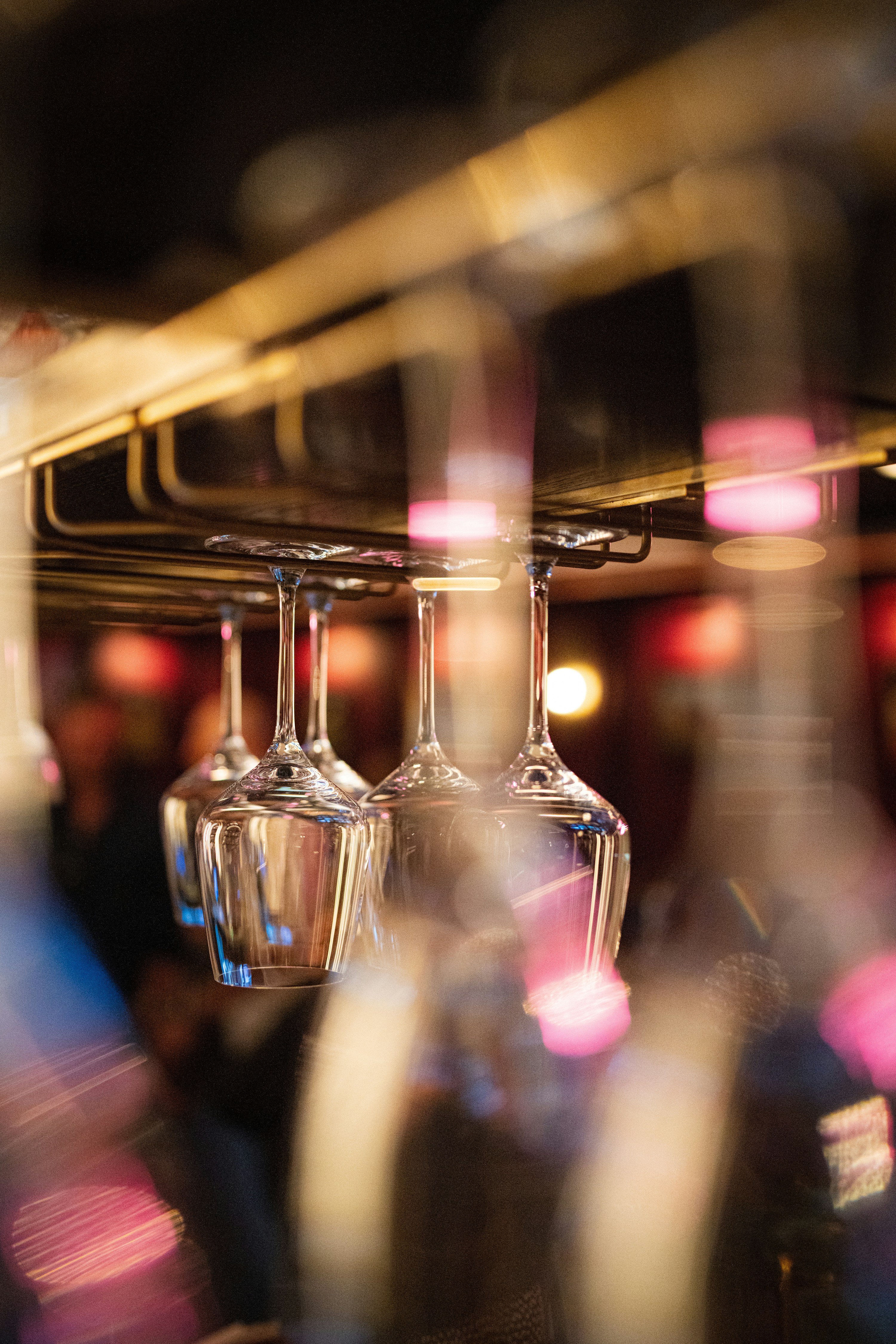 celebratory drinks party bokeh, ilustrasi artikel Open Bar: Toasting the Pros and Cons of a Freely Flowing Event 7