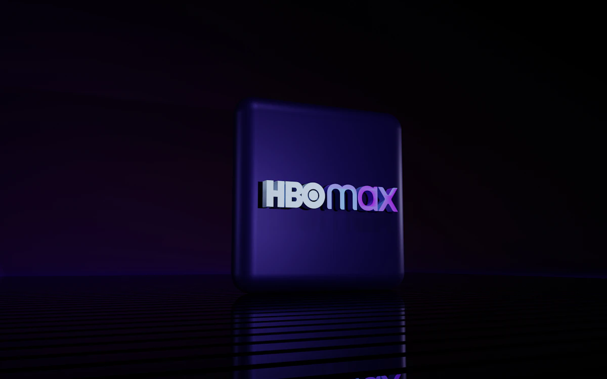 htmx logo over a code background representing the htmx 4.0.0 release