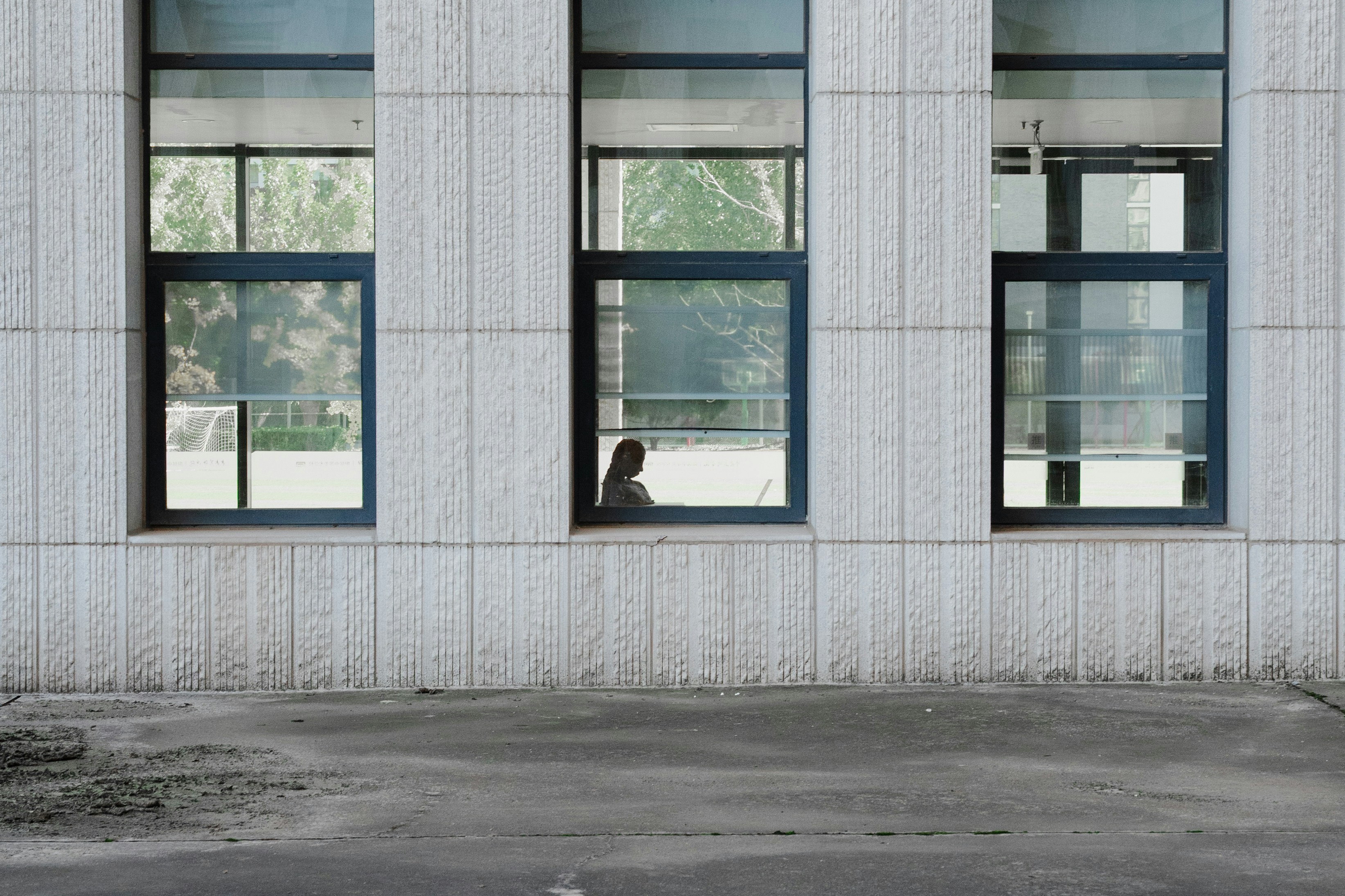 person looking out window - home sexuality