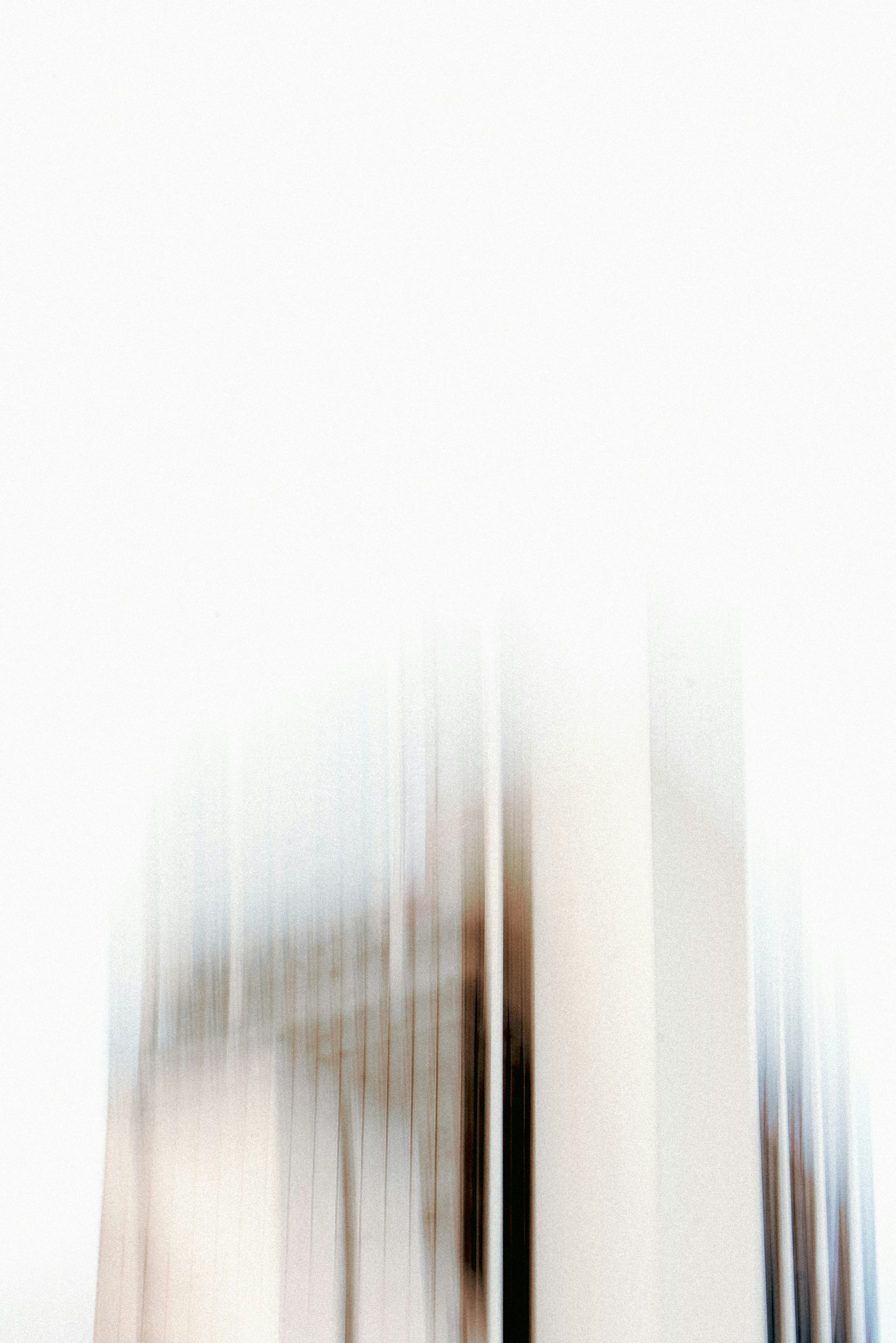 Abstract blurred building facade with white space